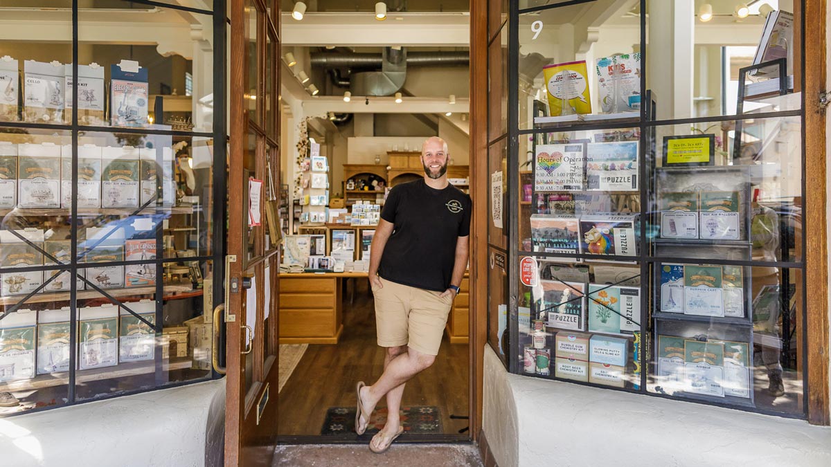 Andrew 'AJ' Rawls stands in the entrance to the Crafter's Library