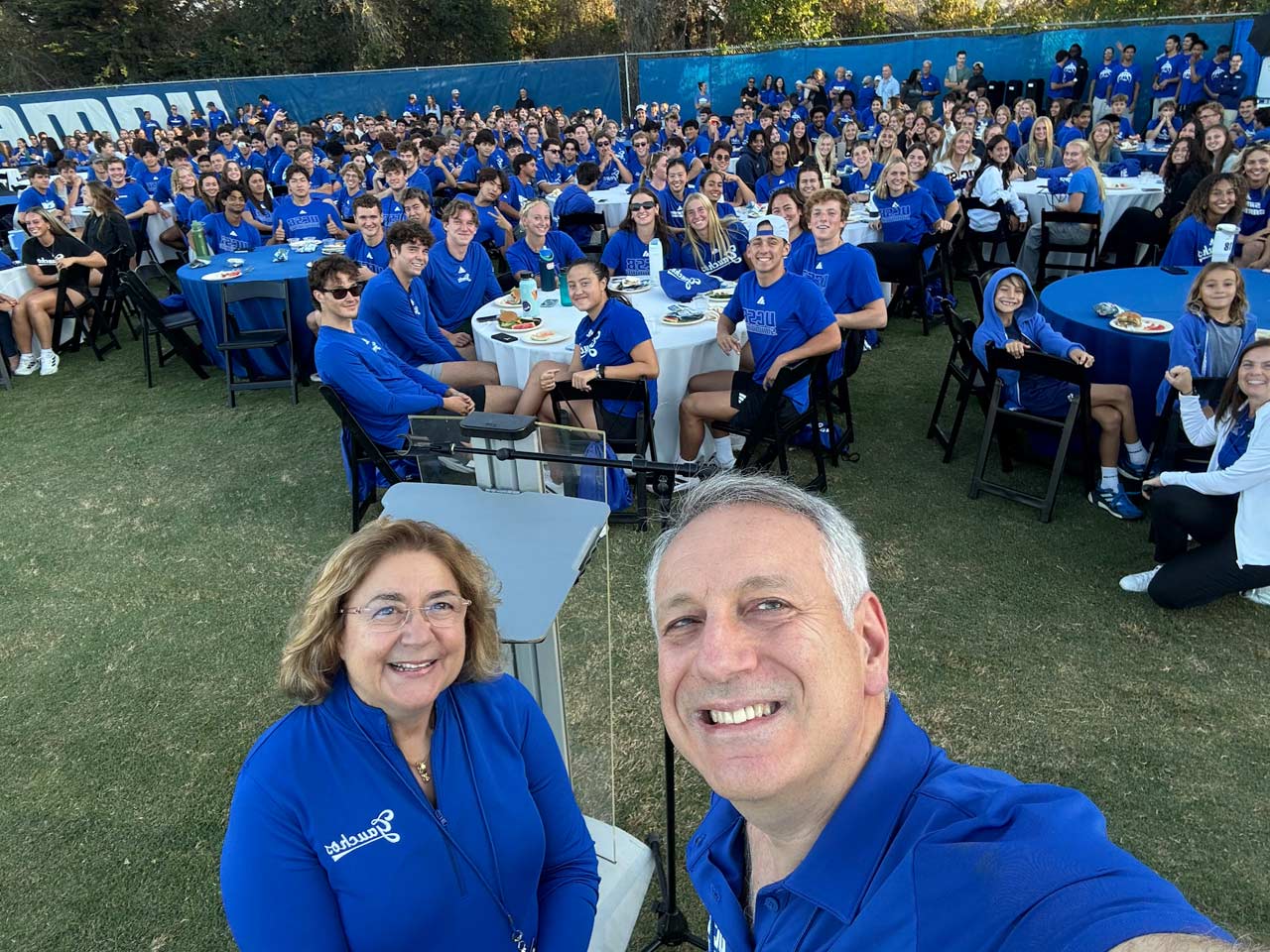Chancellor Assanis and his wife Eleni attend a week of welcome athletics event