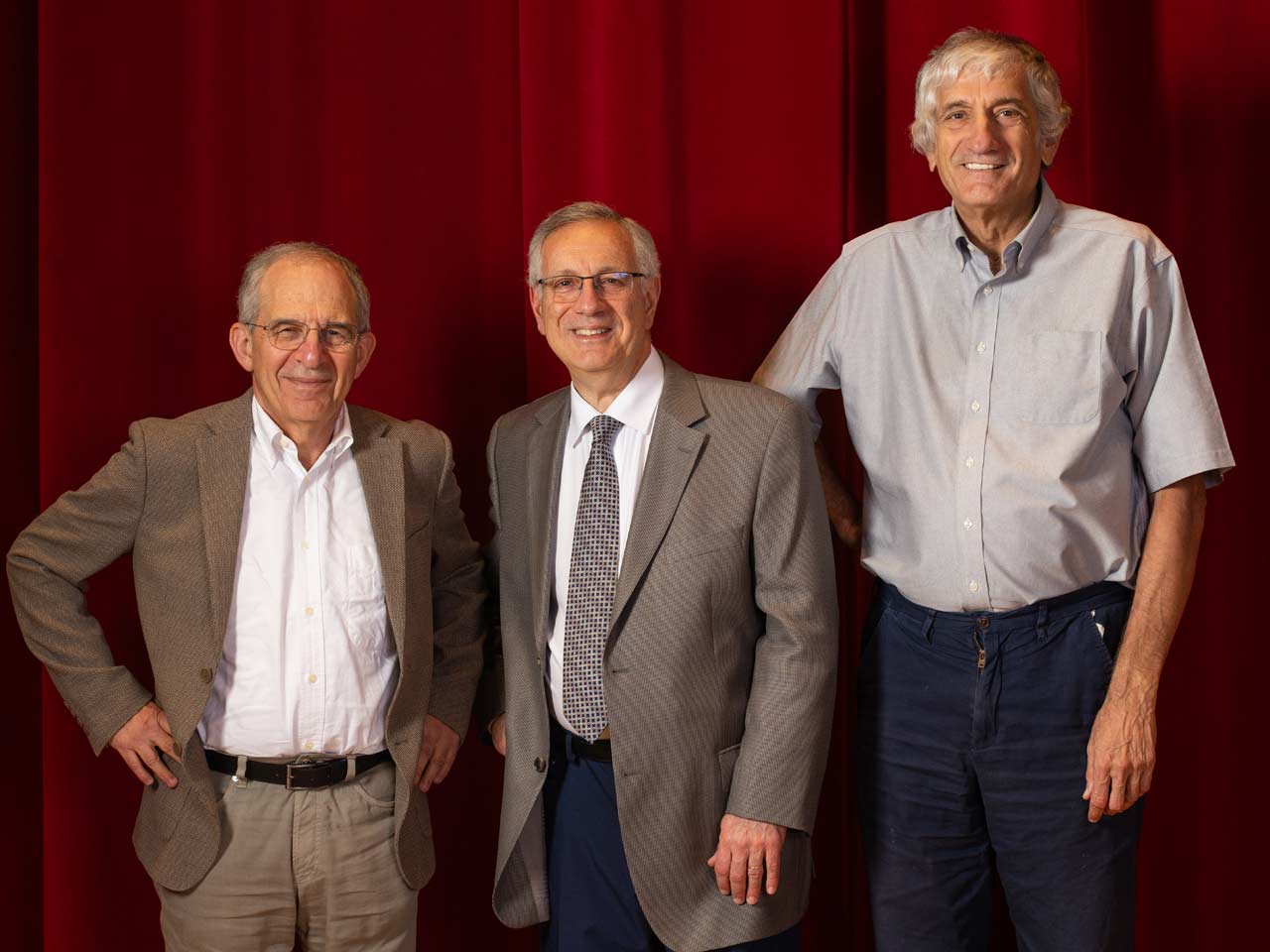 Chancellor Assasnis poses with UCSB's newest Nobel laureates, Michel Devoret and Jon Martinis