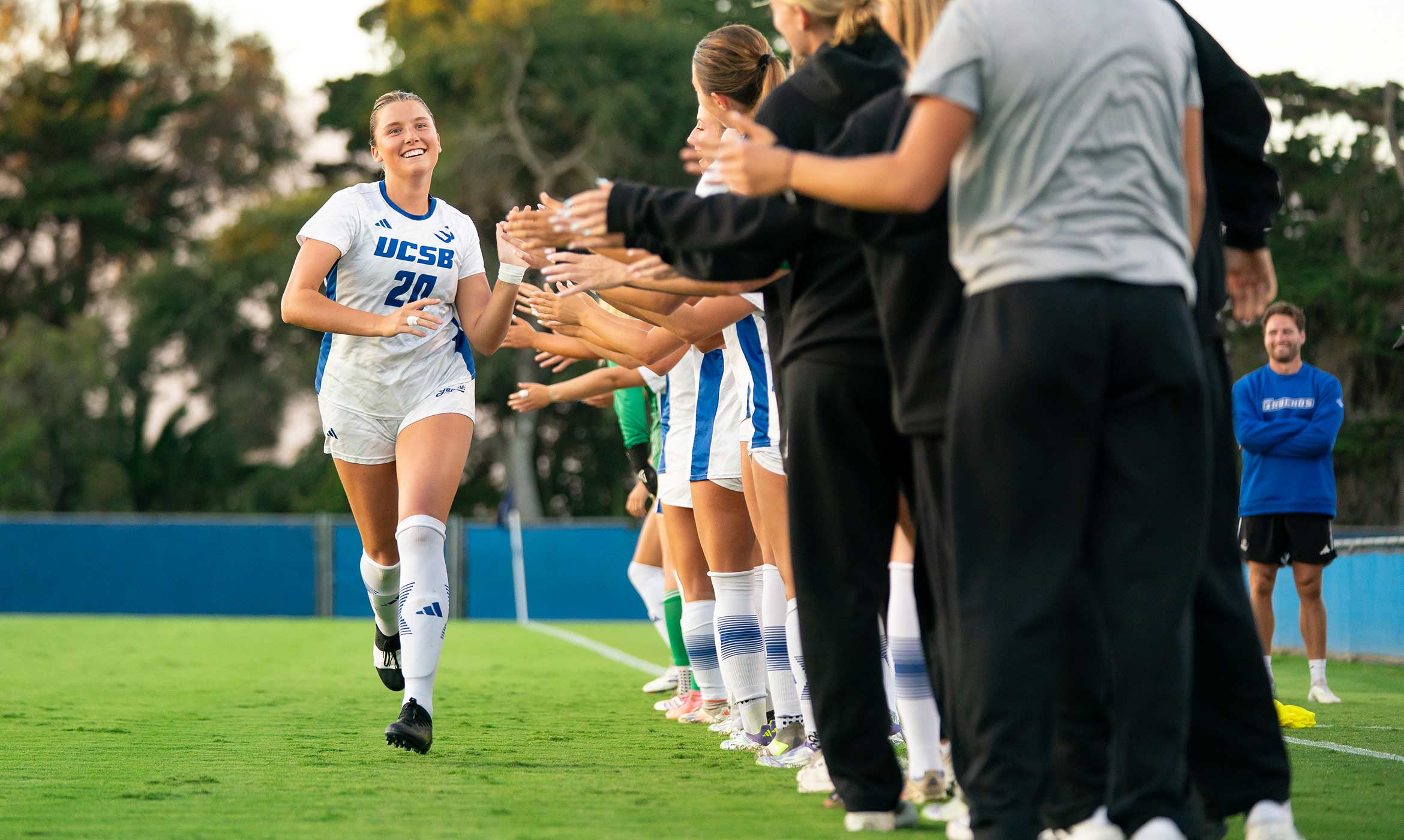 Olivia Howard celebrating with her teammates