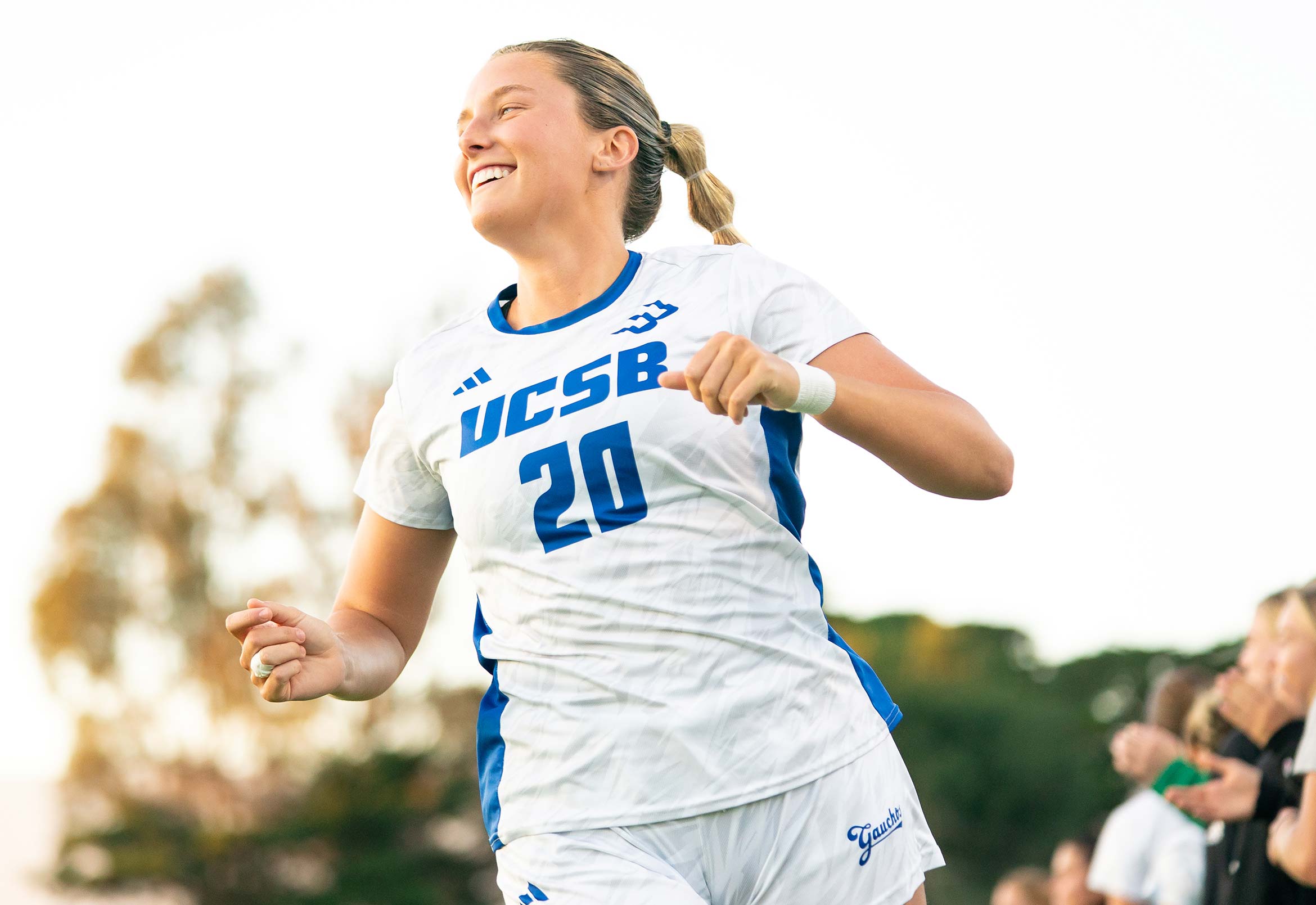 Olivia Howard smiling while running