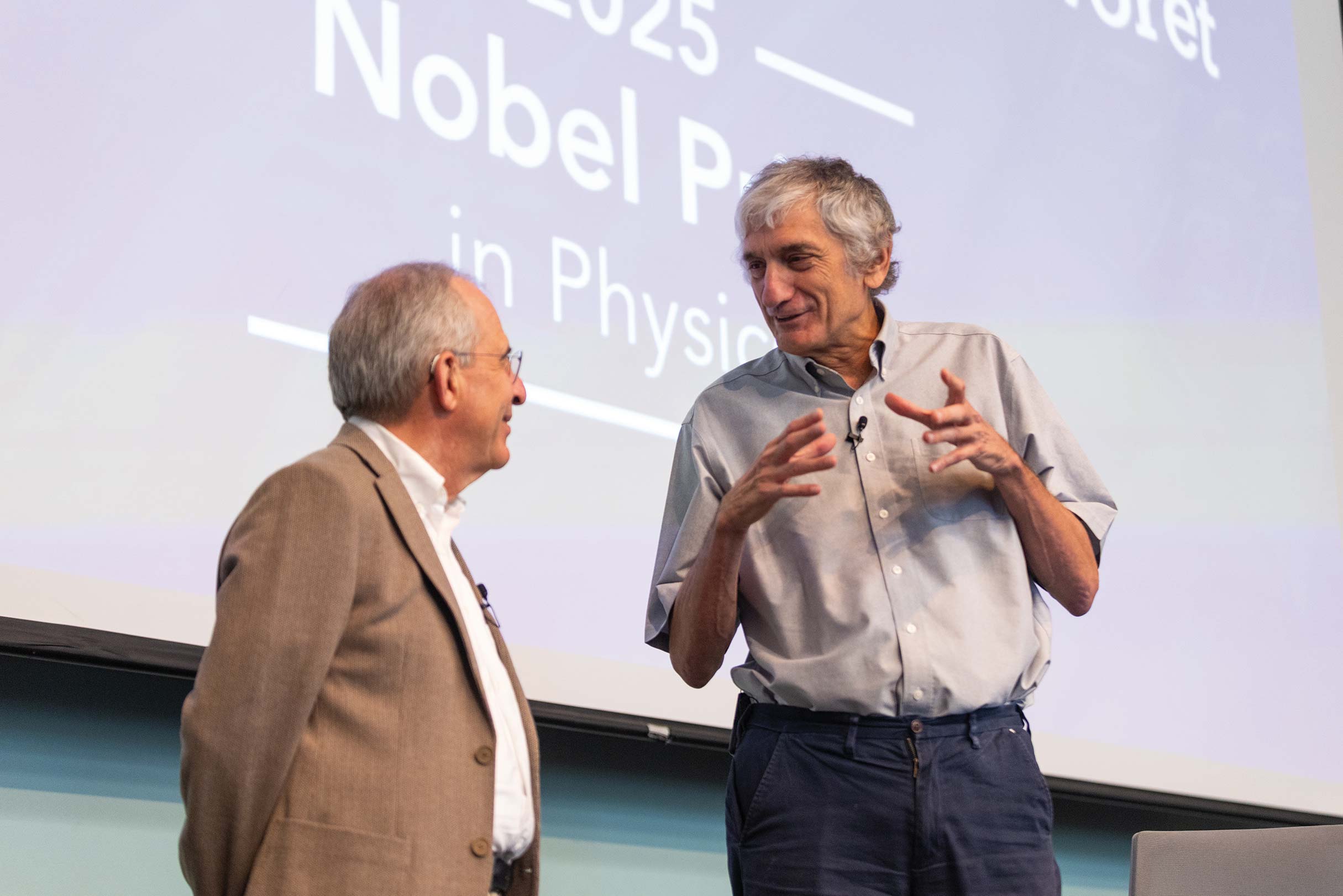 John Martinis and Michel Devoret at a physics colloquium on campus