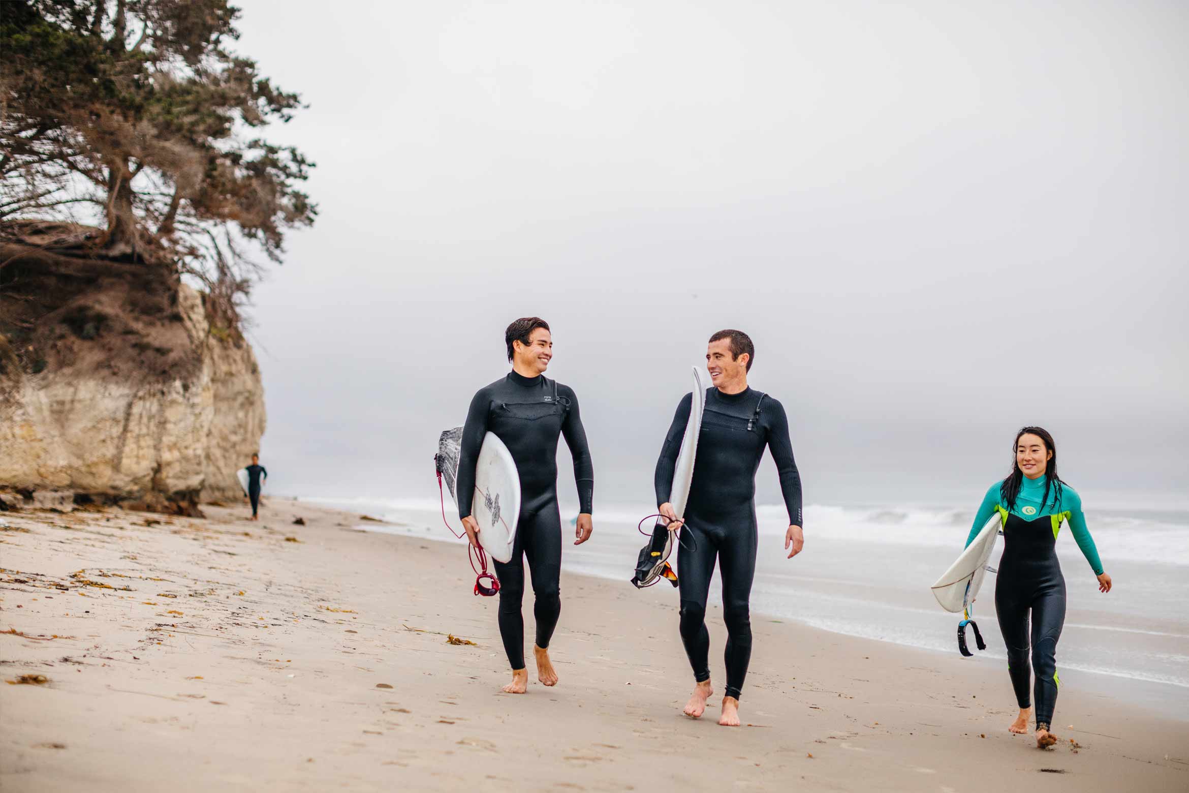 surfers on campus beach