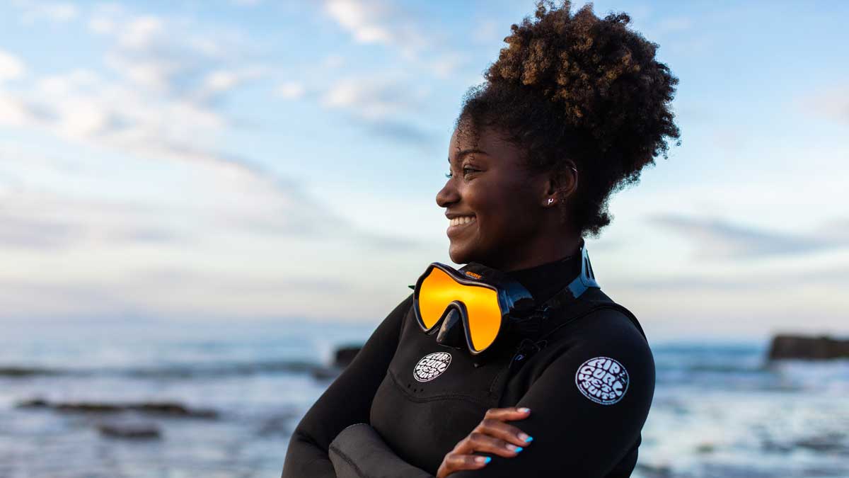 Jada Alexander at Campus Point in a wetsuit