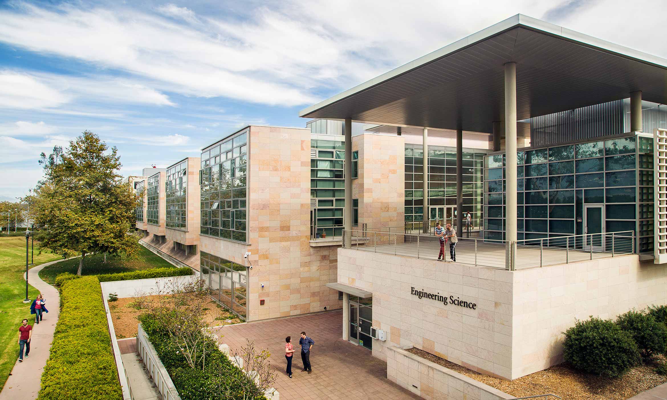 Engineering science building with people walking nearby