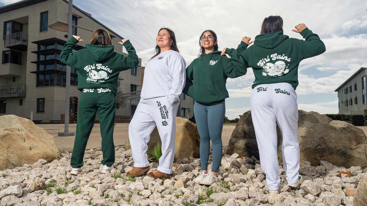 girl gains club members showing their merchandise like sweatpants and sweatshirts