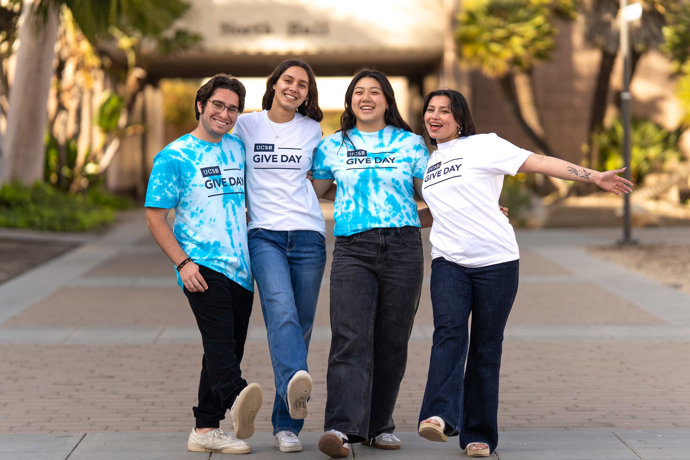 a group of students wearing UCSB Give Day shirts