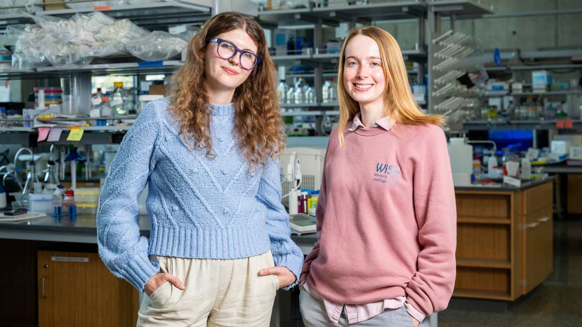 Emily Gemmill and Evensen in a bioengineering lab